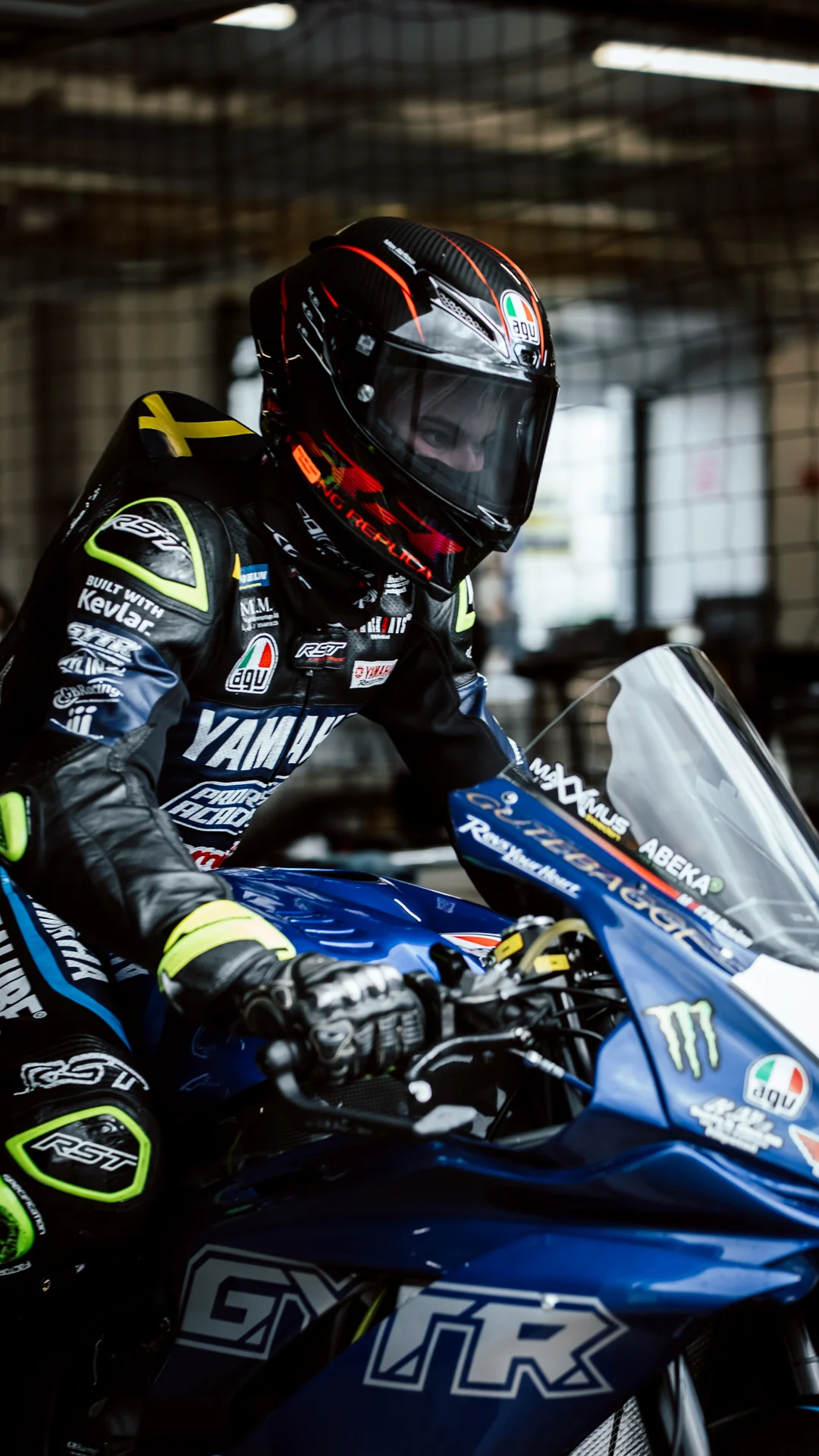 Yamaha rider preparing in the garage